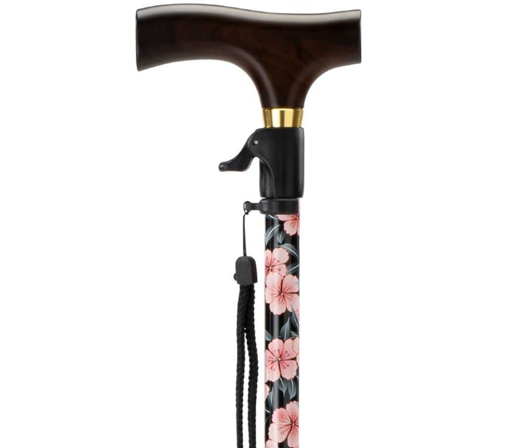 MultiMotion wandelstok met drukknop bediening - Bloemen (ingezoomd op het handvat en de drukknop bediening)