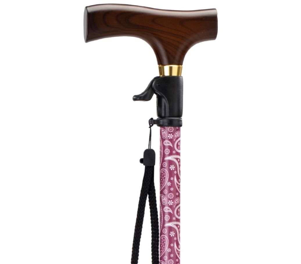 MultiMotion wandelstok met drukknop bediening - Rood paisley (ingezoomd op handvat met drukknop bediening)